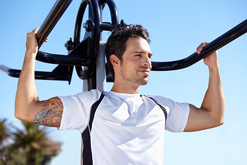 Image showing Happy man, fitness and arm equipment at park gym for exercise, shoulder press or training in the nature outdoors. Fit, active or strong male exercising on workout machine for weightlifting strength