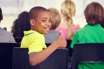 Image showing Portrait, black kid and thumbs up of student in classroom, elementary school or class. Smile, education and child with hand gesture for like emoji, agreement and learning, success and approval sign.