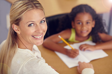 Image showing Portrait, woman and kid to learn for reading on desk in the classroom for studying. Teacher, smile and child learning for student with education at school to study with support or writing on a table.