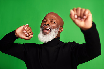 Image showing Happy, dance and face of of black man on green screen for celebration, music or excited. Happiness, smile and energy with senior person dancing isolated on studio background for freedom and movement