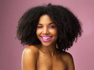 Image showing Face, hair care and smile of black woman with makeup in studio isolated on a pink background for skincare. Beauty portrait, lipstick cosmetics and African female model with salon treatment for afro.