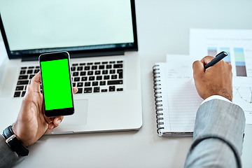 Image showing Phone, green screen and man hands writing notes, ideas and laptop planning for mobile app mockup and business website. Multimedia, computer and person with smartphone mock up, notebook and research