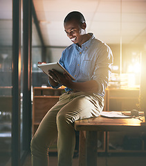Image showing Business, smile and black man with a tablet, typing and online reading with software, modern office and happiness. Male person, employee or entrepreneur with technology, connection and communication