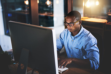 Image showing Business man, night working and computer with dark office typing and project web research. African male worker, technology and coding for IT programmer app for company with tech and internet