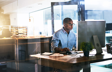 Image showing Business man, working and computer with office typing and project web research with connectivity. African male worker, technology and coding for website management or company with tech and internet