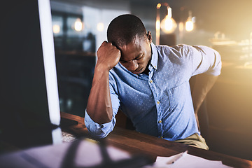 Image showing Black man with back pain, night at office and stress with injury, health problem and burnout from overtime. Male business person work late, backache and medical emergency, bad posture and overworked