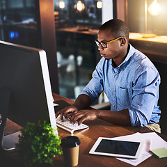 Image showing Business man, night and work on computer with office typing and project web research. African male worker, technology and late coding for online website management for company with tech and internet