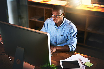 Image showing Business man, night developer and computer with office typing and project web research. African male worker, technology and coding for online website management for company with tech and internet