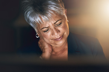 Image showing Stress, night and businesswoman with neck pain in the office to complete a deadline project. Sick, back or shoulder problem and mature professional female employee working overtime in the workplace.