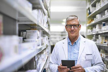 Image showing Pharmacy, portrait and senior man on digital tablet for stock, inventory and medical information notes. Medicine, checklist and face of elderly male pharmacist online for pills and prescription