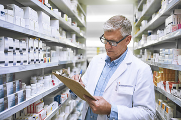 Image showing Pharmacy, medicine and checklist with man writing in drug store for notes, inspection and inventory. Medical, healthcare and pills with male pharmacist in clinic for mature expert or wellness product