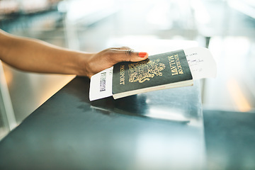 Image showing Hand, passport and airport service counter closeup or boarding flight, support and travel desk administration. Travelling tourist, checkin and person with id book, ticket and journey documents