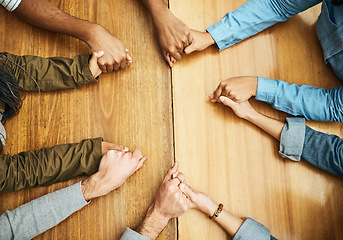 Image showing Hands, support and praying people with trust, love and care for religion or spiritual connection as a group or team. Above, community and christian family doing worship prayer for gratitude