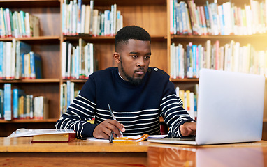 Image showing Laptop, library and university student with research, learning and planning for exam, report or focus on studying, goals and education. Black man, college and working on task, essay or scholarship