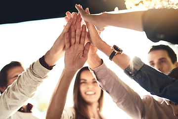 Image showing Business people, hands and high five in meeting for teamwork, winning or success in unity outdoors. Group touching hand for team building, victory or collaboration in solidarity together for goals