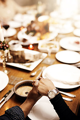 Image showing Prayer, holiday and hand holding with family at table in dining room for party, food or worship. Celebration, support and gratitude with closeup of praying people at home for kindness, dinner or love