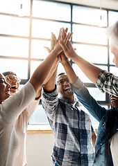 Image showing Staff, high five and group with teamwork, achievement and collaboration in the office, career and creative. Team building, happiness and happy woman with man, goal and celebration with solidarity