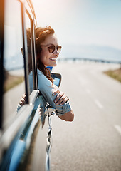Image showing Road trip, travel and happy woman in window of car for adventure, summer vacation and holiday. Transport, relax and face of female person in motor vehicle for freedom, journey and excited for weekend