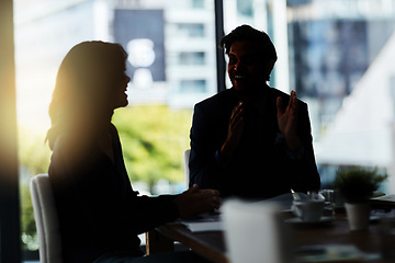 Image showing Dark, happy and business people in meeting at office for discussion, planning and conversation. Corporate workplace, collaboration and man and woman in conference room for morning communication