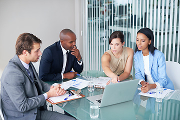 Image showing Laptop, problem solving and business team in a meeting in the office planning corporate project. Discussion, teamwork and professional employees working in collaboration in workplace conference room.