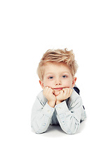 Image showing Kid, model and portrait with shirt in studio background for fashion and youth of a person with confidence. Boy, child and calm in clothes with face for children with hair and confidence for kids.