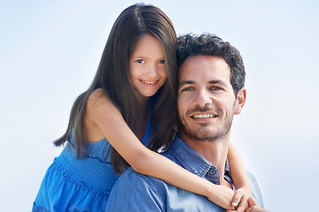 Image showing Happy family father, sky and kid hug dad for fathers day, outdoor fun and spending quality time together. Happiness, youth smile and daughter care, bonding and hugging papa for piggyback ride