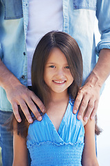 Image showing Smile, happy portrait and young child, girl or kid with hands of parents, father or dad for support, care and bonding. Youth development, childhood growth and daughter happiness for family love