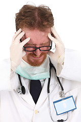 Image showing doctor having headache 