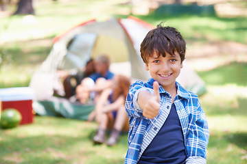 Image showing Happy kid, portrait smile and thumbs up for camping success, winning or victory in nature. Little boy or child smiling and showing thumb emoji, yes sign or like for camp setup, victory or approval