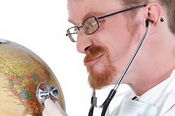 Image showing funny doctor examine a globe 