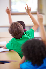 Image showing Classroom, raise hands and children rear for questions, education and language learning or quiz in school. Young group, kindergarten or clever kids with arms up for students support, ideas or answer