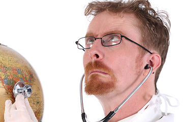 Image showing funny doctor examine a globe 