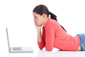 Image showing Laptop, studio floor and woman reading online information, digital web screen or internet research news. Website study, education focus and profile of learning student isolated on white background