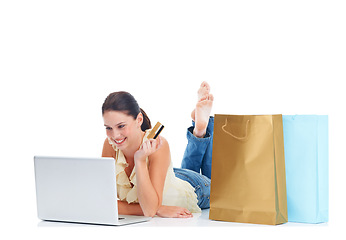 Image showing Online shopping, floor laptop and woman with credit card for fintech bank payment, financial sales product or store website. Ecommerce, retail gift bag or studio customer isolated on white background