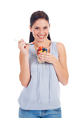 Image showing Happy portrait, woman and fruit salad glass for weight loss, health diet or body detox for wellness lifestyle. Vegan healthcare, nutritionist food and studio model eating isolated on white background