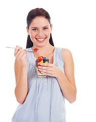 Image showing Portrait smile, woman and fruit salad glass for weight loss, health diet or body detox for wellness lifestyle. Vegan healthcare, nutritionist food and studio model eating isolated on white background