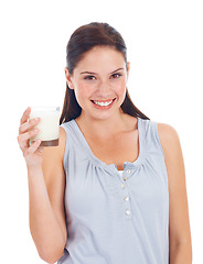 Image showing Happy woman, portrait and glass of dairy milk for vitamin D healthcare benefits, bone health or nutritionist hydration drink. Calcium product, wellness and studio model isolated on white background