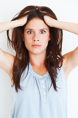 Image showing Portrait, shocked and woman touching her hair in studio isolated on a white background. Wow, omg and face of female person with surprised expression, emoji and unexpected news, announcement and wtf.