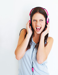 Image showing Music headphones, singer and woman listening to fun girl song, wellness audio podcast or radio sound. Crazy studio singer, excited energy and singing model streaming edm isolated on white background