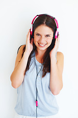 Image showing Music headphones, happiness and woman portrait listening to girl song, wellness audio podcast or radio sound. Happy studio smile, freedom and model streaming edm playlist isolated on white background