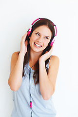 Image showing Music headphones, fun and happy woman listening to pop girl song, wellness audio podcast or radio sound. Studio smile, youth freedom or gen z model streaming edm playlist isolated on white background