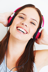 Image showing Music headphones, happy face and woman portrait listening to fun girl song, wellness audio podcast or radio sound. Studio smile, freedom and model streaming edm playlist isolated on white background