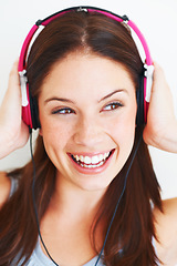 Image showing Music headphones, studio face and happy woman listening to fun girl song, wellness audio podcast or radio sound. Smile, freedom and gen z model streaming edm playlist isolated on white background