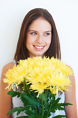 Image showing Flower bouquet, face smile or studio woman with floral product, sustainable gift or yellow spring present. Nature growth, happy organic beauty and eco friendly model girl isolated on white background