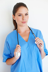 Image showing Studio portrait, stethoscope or healthcare nurse ready for nursing career, health care service or cardiology support. Medicine doctor, caregiver woman or hospital surgeon isolated on white background