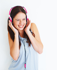 Image showing Music headphones, loud and happy woman listening to fun girl song, wellness audio podcast or radio sound. Happiness, studio freedom and gen z model streaming edm playlist isolated on white background