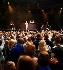 Image showing Dance, music and stage with crowd at festival for concert, dj show and rave performance. Rock, energy and hands of people dancing in audience for party celebration, disco and techno event