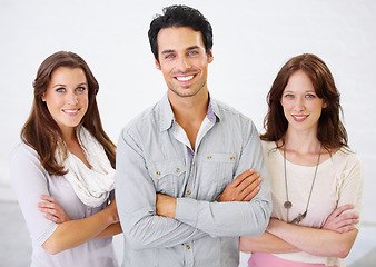 Image showing Portrait, group and business people with arms crossed for leadership in office workplace together. Smile, friends and employees standing with confidence, teamwork and collaboration in company.