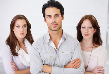 Image showing Group, portrait and business people with arms crossed for leadership in office workplace together. Serious, professional and employees standing with confidence, teamwork and collaboration in company.