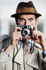 Image showing Vintage agent man, street and camera for investigation, inspection or suspicious journalist at job. Private investigator, secret photographer and retro paparazzi with focus, surveillance or portrait